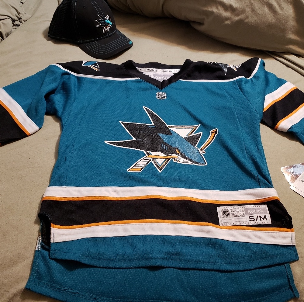 NWT licensed NHL teal youth Sharks Jersey